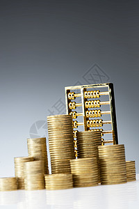 黄色金融三折页金色财会大量金币和算盘背景
