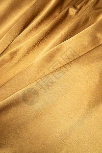 华贵布料垂直构图金色丝绸图片