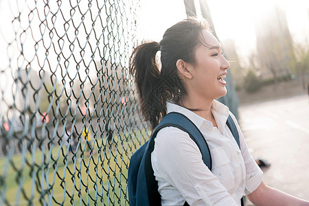 书包东方人表现积极青年女大学生图片