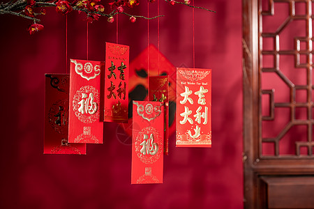 春节喜庆福字庆祝春节东亚悬挂在梅花下面的红包背景