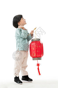 人拿着文化一个小男孩手提红色灯笼庆祝新年图片