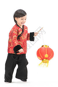 乐趣人幸福一个小男孩手提红色灯笼庆祝新年图片