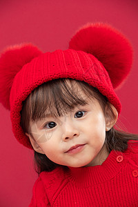 愉悦气氛传统文化穿红衣戴红帽的可爱小女孩图片