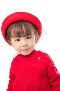 庆祝快乐传统节日穿红衣戴红帽的可爱小女孩图片