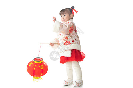 愉悦儿童2岁到3岁一个小女孩手提红色灯笼庆祝新年图片