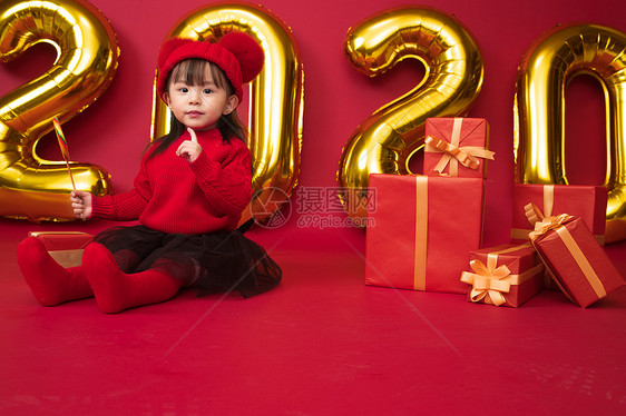 裙子影棚拍摄节日可爱的小女孩过新年图片