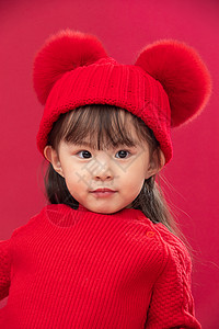 幸福玩耍儿童穿红衣戴红帽的可爱小女孩图片