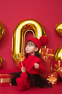 2岁到3岁坐着彩色图片可爱的小女孩吃棒棒糖图片