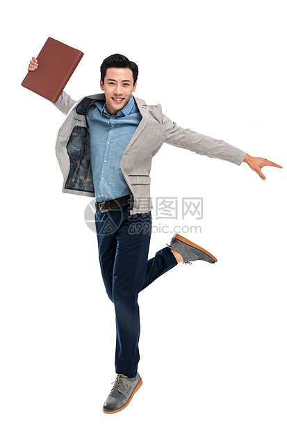 快乐跳跃的青年商务男士图片