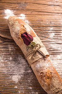 玫瑰花和面包背景图片