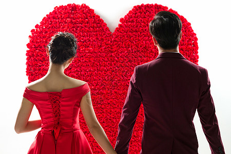 爱心小装饰素材站着红色玫瑰花前浪漫情侣背影背景