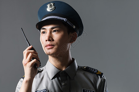青年男人制服服务业职位青年男保安背景图片