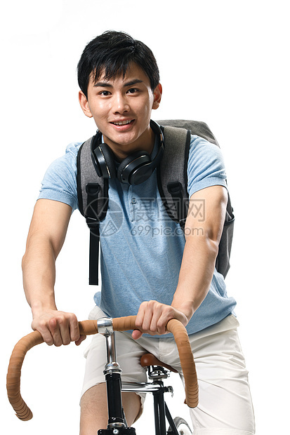 时尚活力户内年轻的大学生骑自行车图片