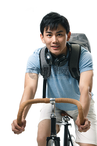 责任包满意年轻的大学生骑自行车图片