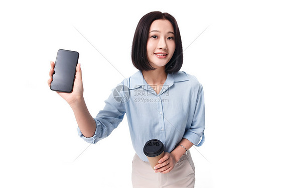 20多岁水平构图健康的女白领手拿咖啡杯图片