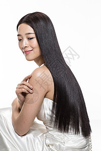 亚洲人妆面美容有着柔顺的长发的美女图片