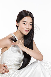 大半身亚洲人东方人有着柔顺的长发的美女图片