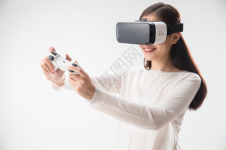 科技媒体戴着VR眼镜的青年女人背景