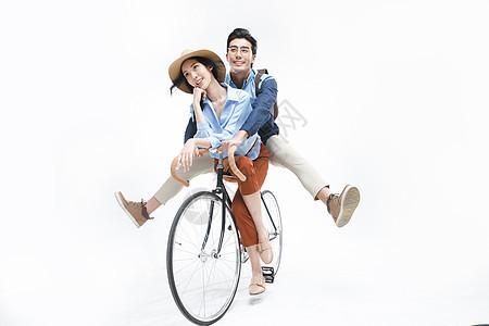 时尚动作两个人青年情侣骑自行车图片