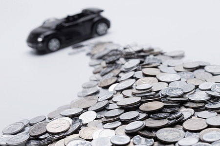 购物贷款财务项目硬币和汽车模型图片