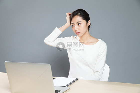 商务东方人摄影疲劳的女白领图片
