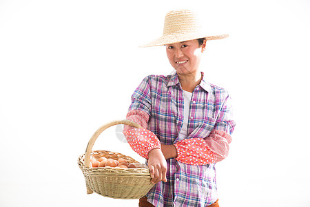 中年女人拿着一篮子鸡蛋图片