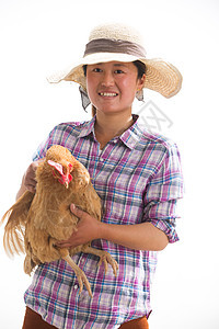 草帽中年女人拿着一只鸡图片