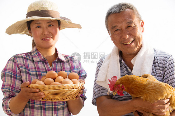 东亚农民拿着鸡和鸡蛋图片