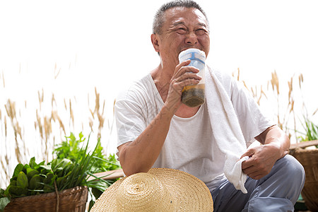 菜贩农民和他的蔬菜高清图片