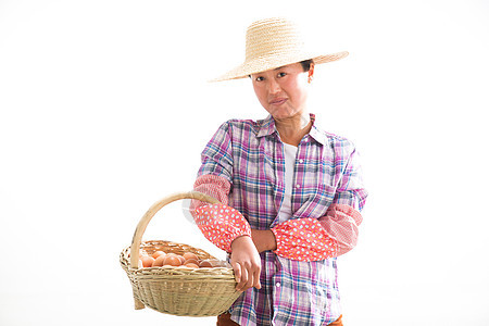 中年女人拿着一篮子鸡蛋图片