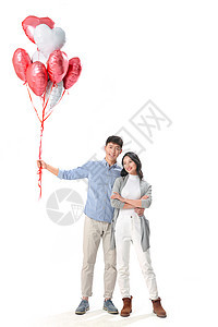 浪漫情侣拿着心形气球图片