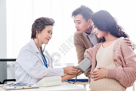 医院医护服保健医生给孕妇量血压图片