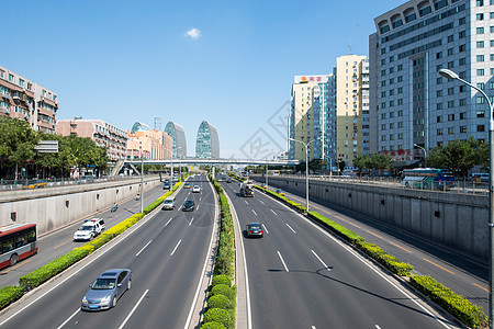 现代城市街道北京西直门建筑群和道路背景