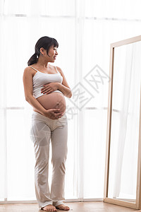 简单怀孕母亲孕妇照镜子图片