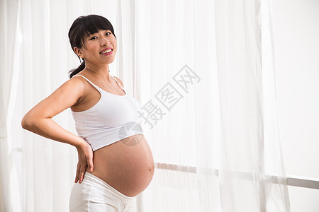大半身成年人身体保养幸福的孕妇图片