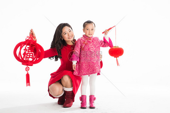 愉悦红色拜年幸福母女庆祝新年图片