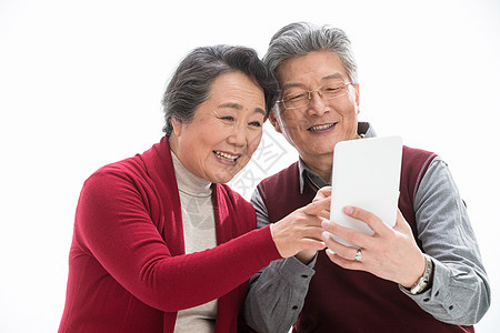 过年打电话手机老年夫妇过新年背景图片