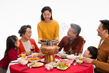 拿着肉的女孩饮食毛衣摄影幸福家庭过年吃团圆饭背景