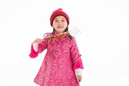 甜食文化传统文化欢乐的小女孩吃糖葫芦图片
