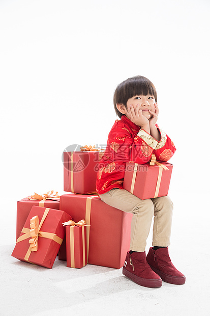 圣诞礼物传统庆典祝福小男孩过新年图片