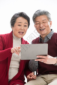 老年夫妇用平板电脑图片