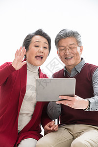 老年夫妇用平板电脑图片