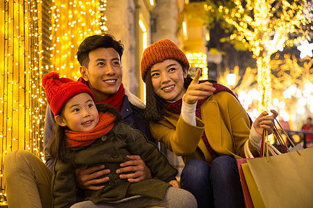 夜晚休闲活动童年快乐家庭节日购物图片