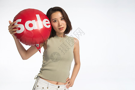 亚洲人放松仅女人快乐的年轻女孩拿着气球图片
