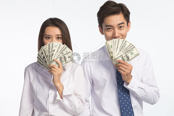 两个人衬衫东亚商务青年男女拿着美元图片