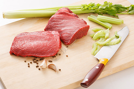 猪肉纹理大蒜肉和芹菜背景