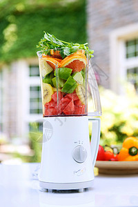 静物蔬菜营养装满水果的榨汁机背景图片