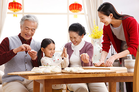 共建和谐家园东亚父亲和谐快乐家庭过新年包饺子背景