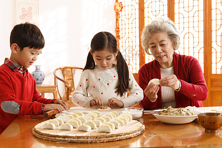 冬至祝福老人教孩子们学包饺子背景