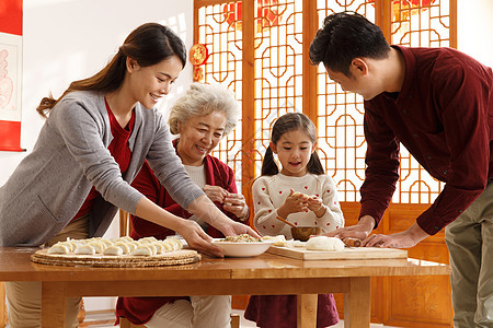 儿童户内传统文化幸福家庭过年包饺子图片